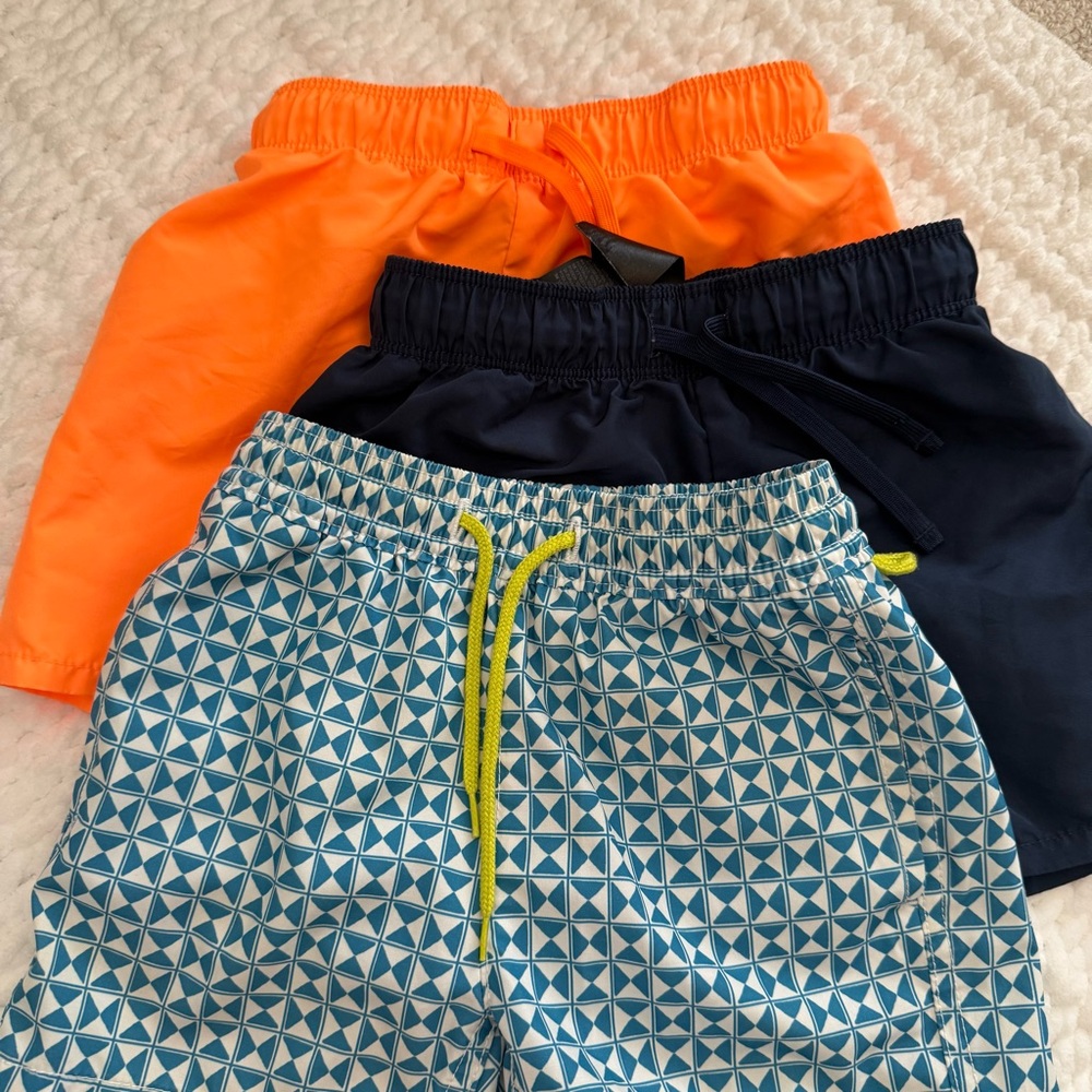 Bundle of three swim trunks:  Kids Geometric Patterned and Solid swim trunks